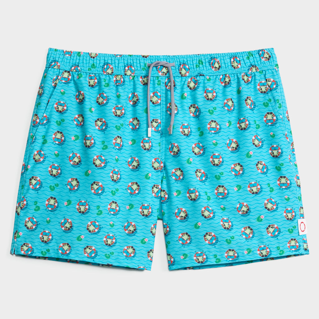 The CROAK & FLOAT men’s swim short by PUBLIC BEACH SWIM features a turquoise quick-dry design with cartoon lifebuoys, green palm trees, and wavy blue lines—perfect for comfy days at the beach.