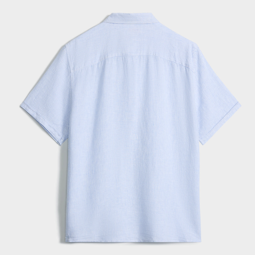 Back view of the PUBLIC BEACH SWIM STRIPE SHIRT, a light blue short sleeve collared linen shirt with subtle white pinstripes, shown against a plain white background.