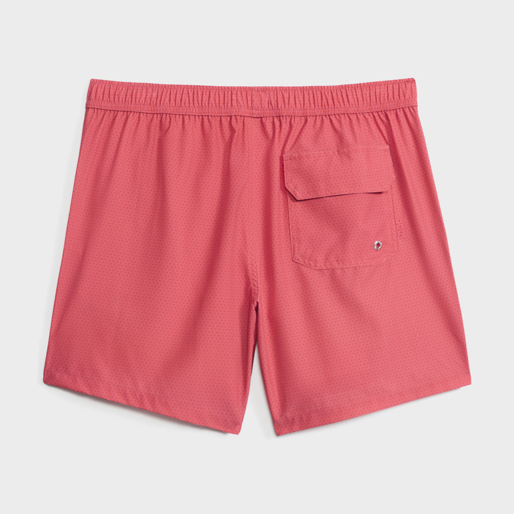 The PUBLIC BEACH SWIM LINK FLOW men's pink swim shorts feature an elastic waistband, a flap back pocket with drainage grommet, and quick-dry fabric. Shown on a white background—ideal swimwear for beach days.
