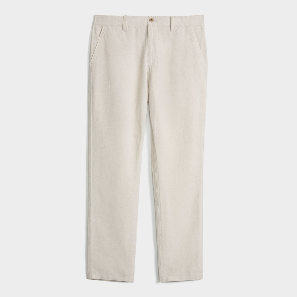 A pair of PUBLIC BEACH SWIM LINEN BLEND PANTS in light beige, featuring a straight-leg cut, side pockets, belt loops, and breathable linen-cotton fabric, shown on a white background.